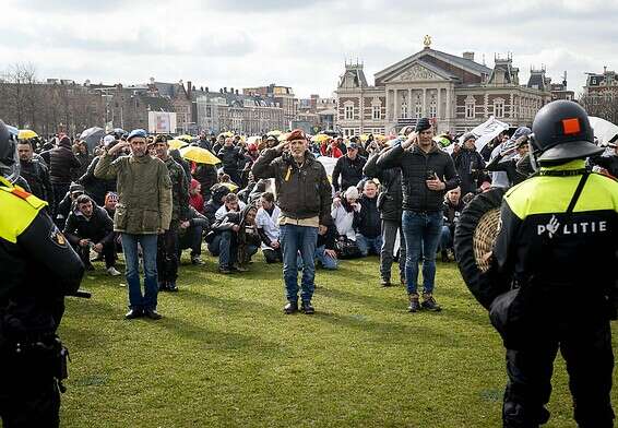 הפגנה נגד הסגר בהולנד // צלום: איי.אף.פי