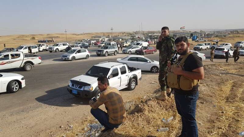 אלפי אזרחים נסים מכירכוכ בחסות הפשמרגה // צילום: סוכנויות הידיעות