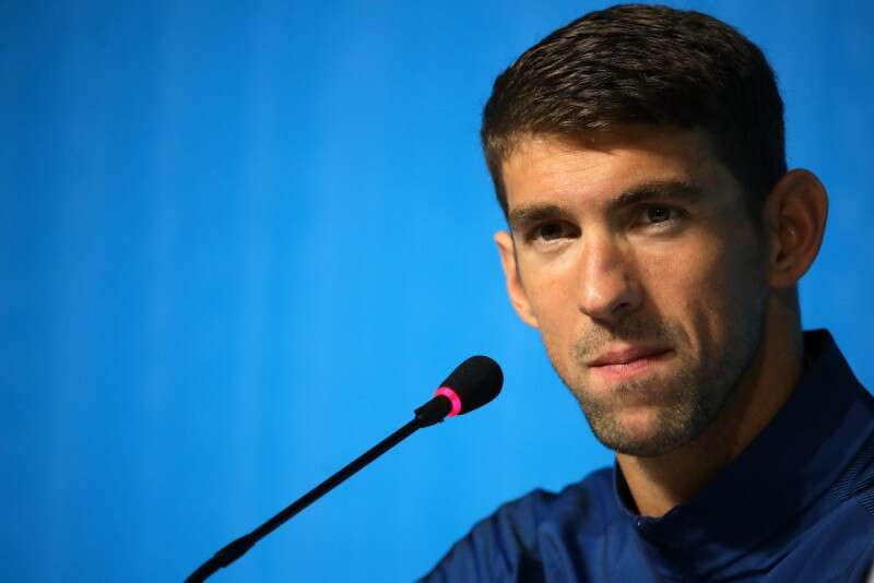 מייקל פלפס. זכה לכבוד הראוי לו כנושא הלפיד האולימפי // צילום: Gettyimages