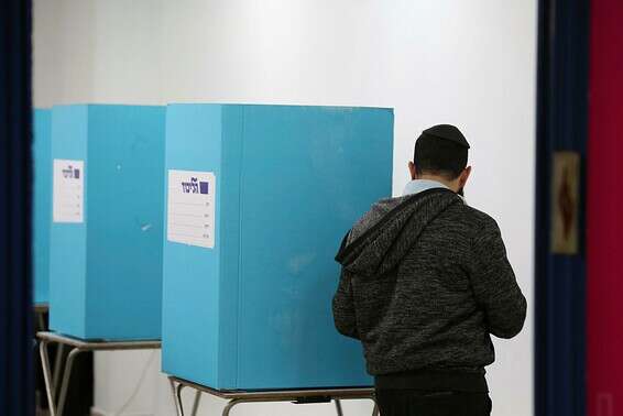 מתפקד הליכוד מצביע בפריימריז הקודמים של המפלגה, בשנה שעברה // צילום: דוד כהן, ג'יני