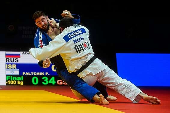 פלצ'יק זורק את אדמיאן בגמר // צילום: אי.אף.פי