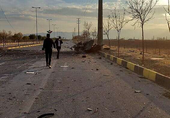 אחד מכלי הרכב שהתפוצצו בזירת ההתנקשות // צילום: איי.אף.פי