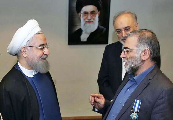 ראש תוכנית הגרעין האיראנית שחוסל, מוחסן פחריזאדה, והנשיא חסן רוחאני // צילום: אי.אף.פי