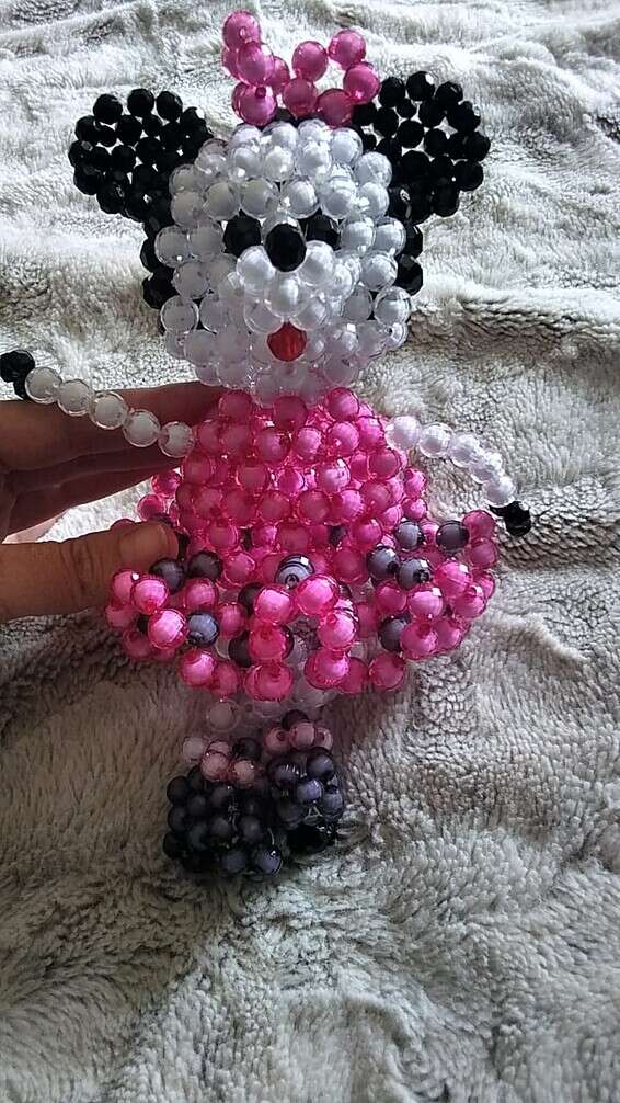 בובת חרוזים שהכינה בכלא. "מתנה לאחיינית"