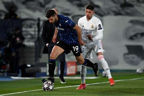 ואלוורדה משגיח על ג'ימשיטי, הערב במדריד // צילום: אי.אף.פי