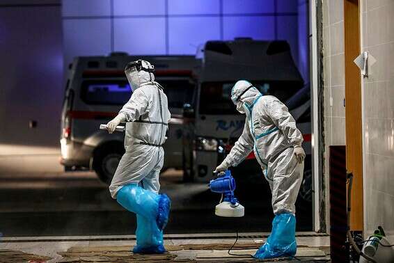 "בסין הצליח לצמצם את מספר החולים" // צילום: איי.אף.פי