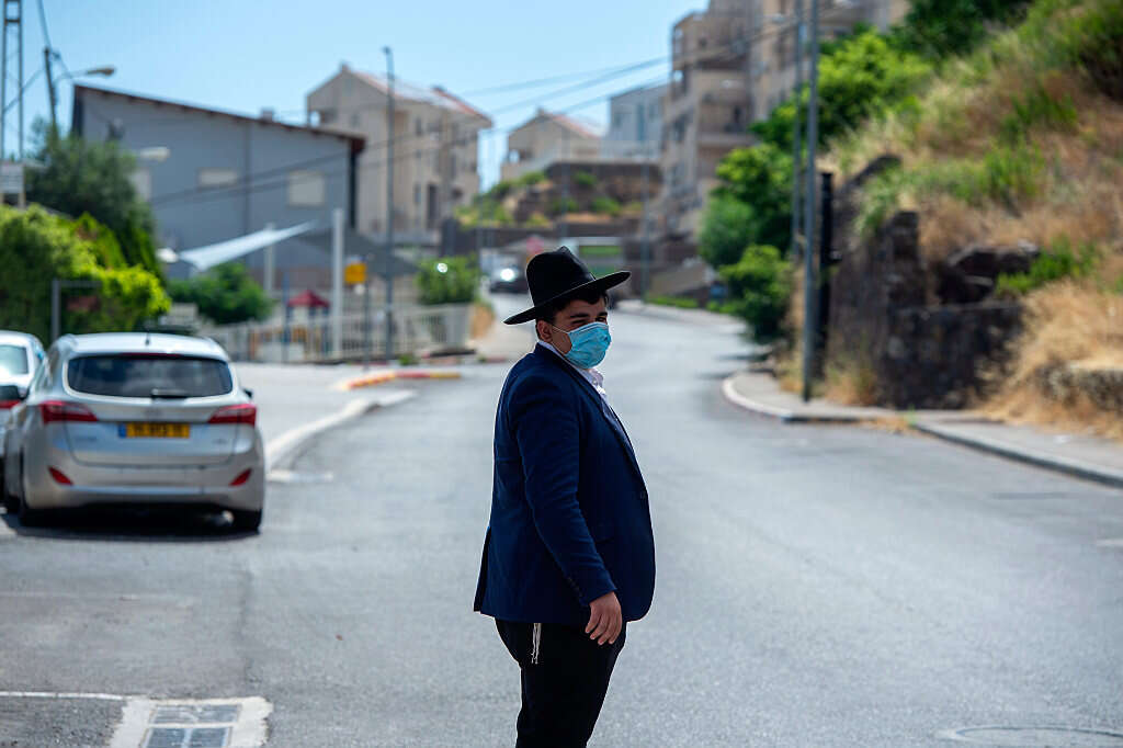 צילום: גיל אליהו - ג׳יני // סגר בשכונה חרדית בטבריה ,