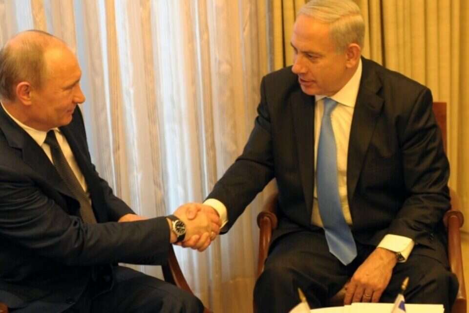 צילום: עמוס בן גרשום, לע"מ // פוטין ונתניהו בפתח פגישתם ,