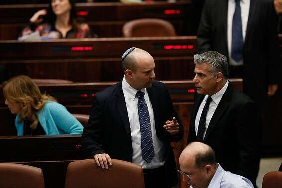 לפיד (מימין) ובנט // צילום: אורן בן חקון