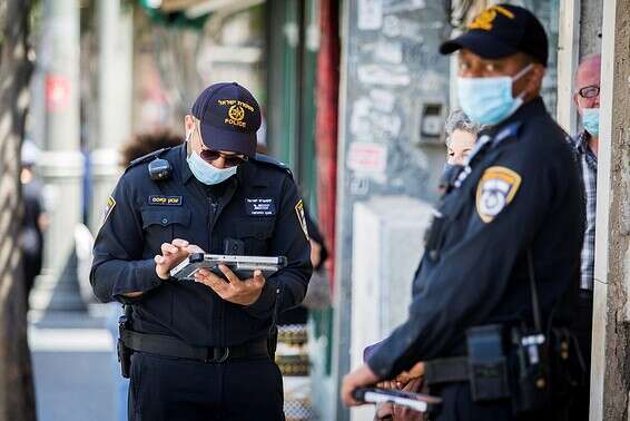אכיפת תקנות הממשלה בירושלים // צילום ארכיון: אורן בן חקון