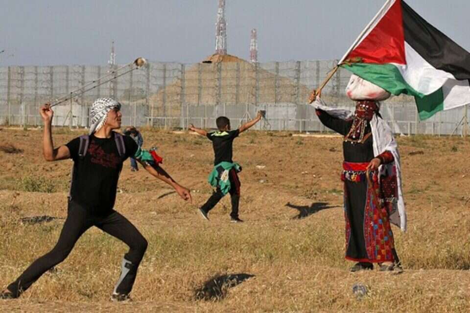 מהומות בגבול עזה, היום // צילום: אי.אף.פי // מהומות בגבול עזה, היום // צילום: אי.אף.פי ,