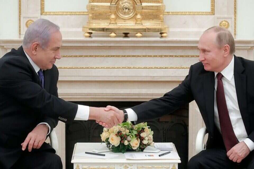 צילום: אי.פי.איי // "השבת הגופה לא הייתה פעולה חד צדדית". פוטין ונתניהו ,