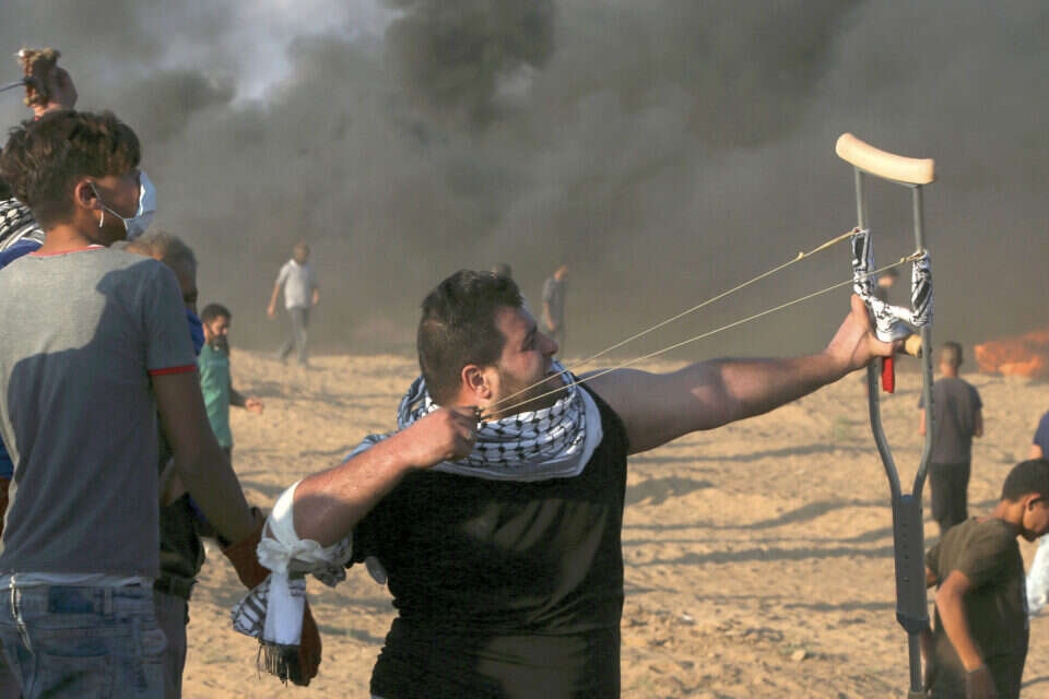 מבחן יום שישי. התפרעויות בגדר הגבול // צילום: אי.פי // מבחן יום שישי. התפרעויות בגדר הגבול ,