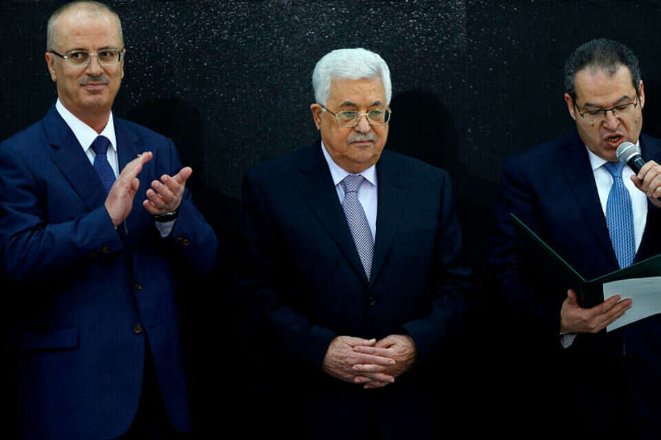 אבו מאזן וראש הממשלה הפלשתיני ראמי חמדאללה// צילום: AFP ,