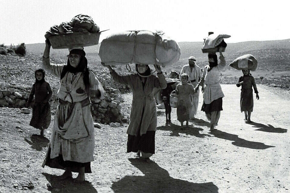 תושבים ערבים עוזבים את כפרם בגליל, 1948 , רויטרס