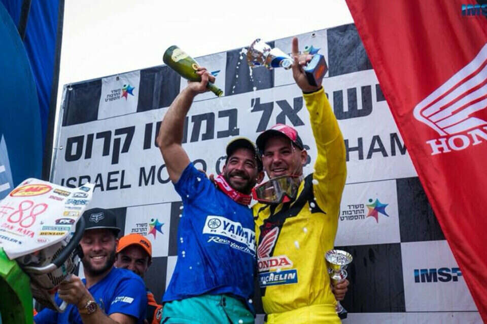 שחר בלולו על הפודיום // צילום: יח"צ ,