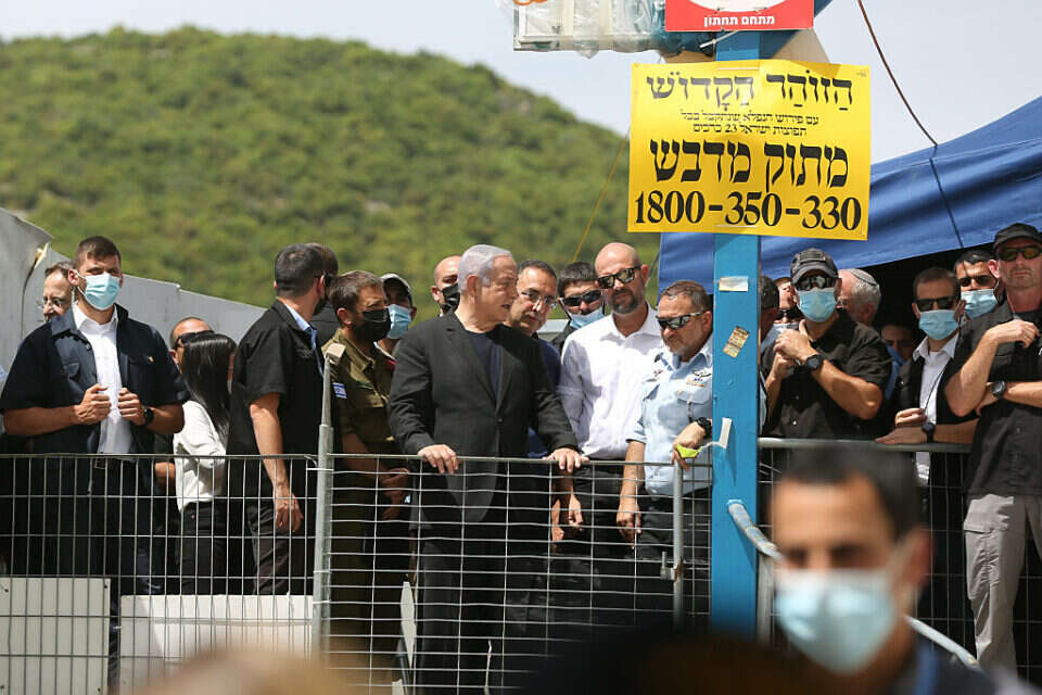 בנימין נתניהו ואמיר אוחנה בזירת האסון במירון, מאי 2021