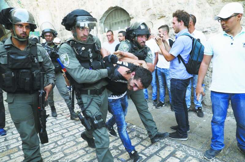 מהומות בבירה אתמול // צילום: איי.אפ.פי