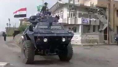 כוחות הדיוויזיה התשיעית מגיעים לעיר מוסול // צילום: סוכנויות הידיעות