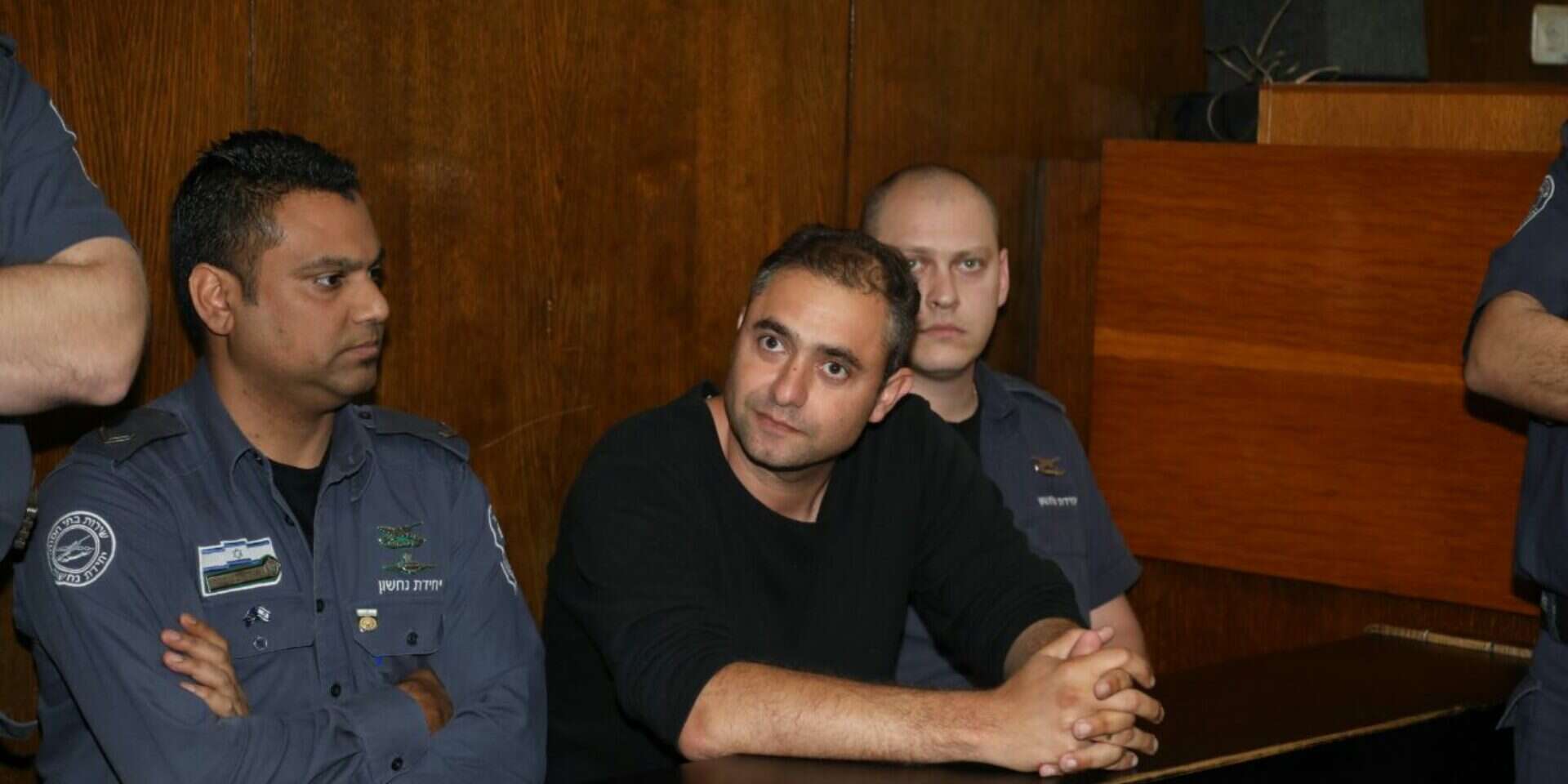 קצין המשטרה לשעבר, ערן מלכה, בביהמ"ש // צילום: גדעון מרקוביץ' // קצין המשטרה לשעבר, ערן מלכה, בביהמ"ש // צילום: גדעון מרקוביץ' ,
