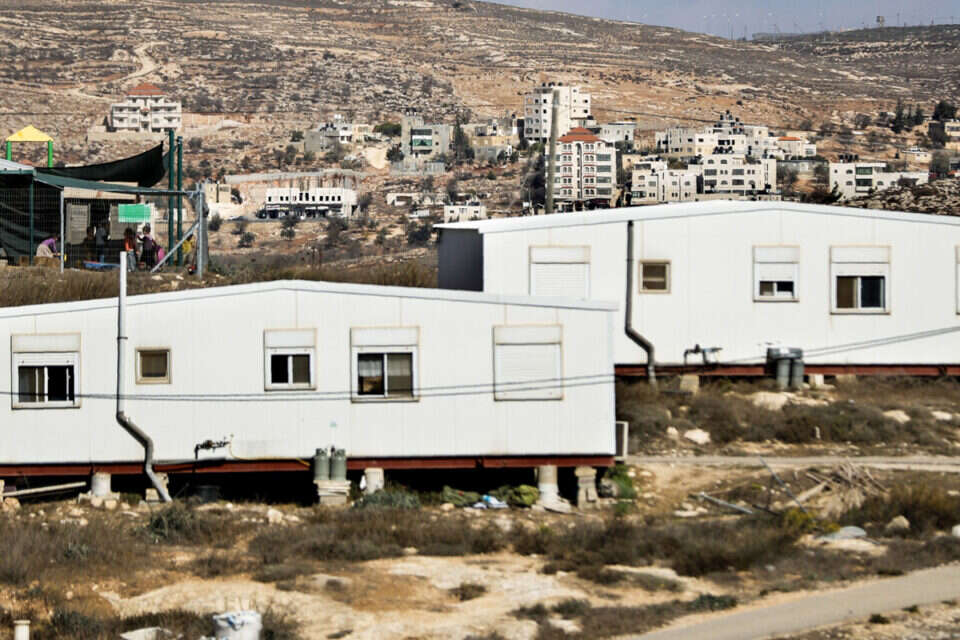 יאושרו מבנים לא חוקיים ביו"ש  //  צילום: אי.אף.פי // יאושרו מבנים לא חוקיים ביו"ש , 