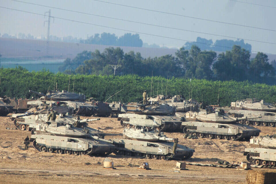 ההיגררות למלחמה היתה בלתי נמנעת. טנקים של צה"ל במהלך צוק איתן // צילום: ליאור מזרחי // ההיגררות למלחמה היתה בלתי נמנעת. טנקים של צה"ל במהלך צוק איתן ,