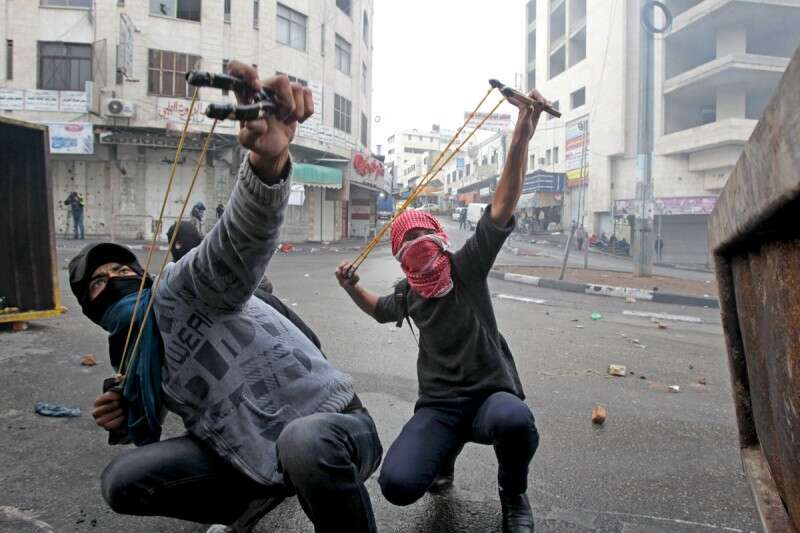 "אין לנו דרך לשכנע אותם מדוע הם צריכים להפסיק עם זה". מיידי אבנים // צילום: איי.אף.פי