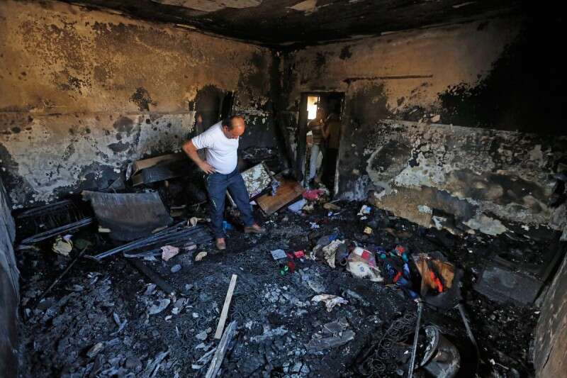 "פשע, לא טרגדיה". בית משפחה דאוובשה בדומא // צילום: אי.פי.איי