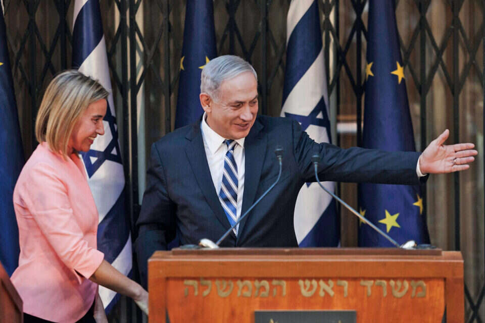נתניהו ומוגריני בחודש מאי \ צילום ארכיון: אי.פי // נתניהו ומוגריני בחודש מאי ,