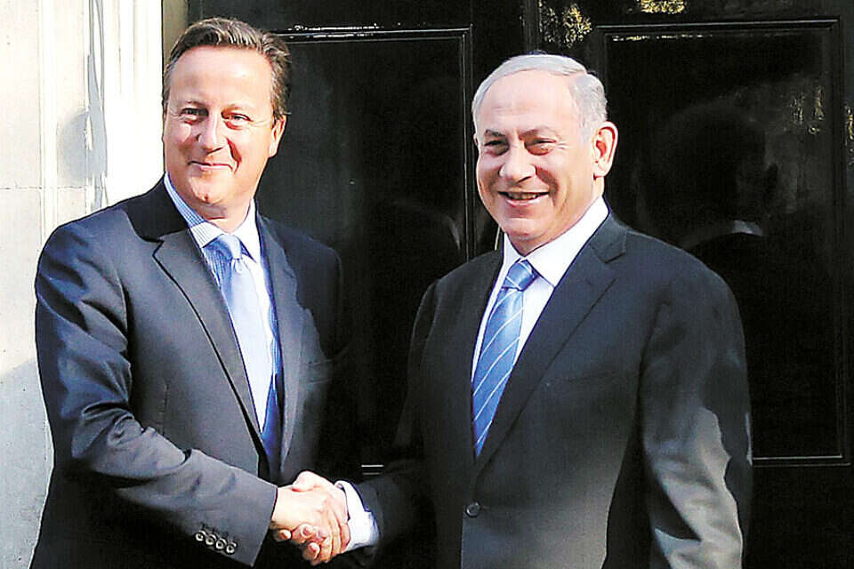 צילום: אי.פי // אירופה מוטרדת מהפליטים, פחות מאיראן. בנימין נתניהו ודיוויד קמרון, בשבוע שעבר בלונדון ,