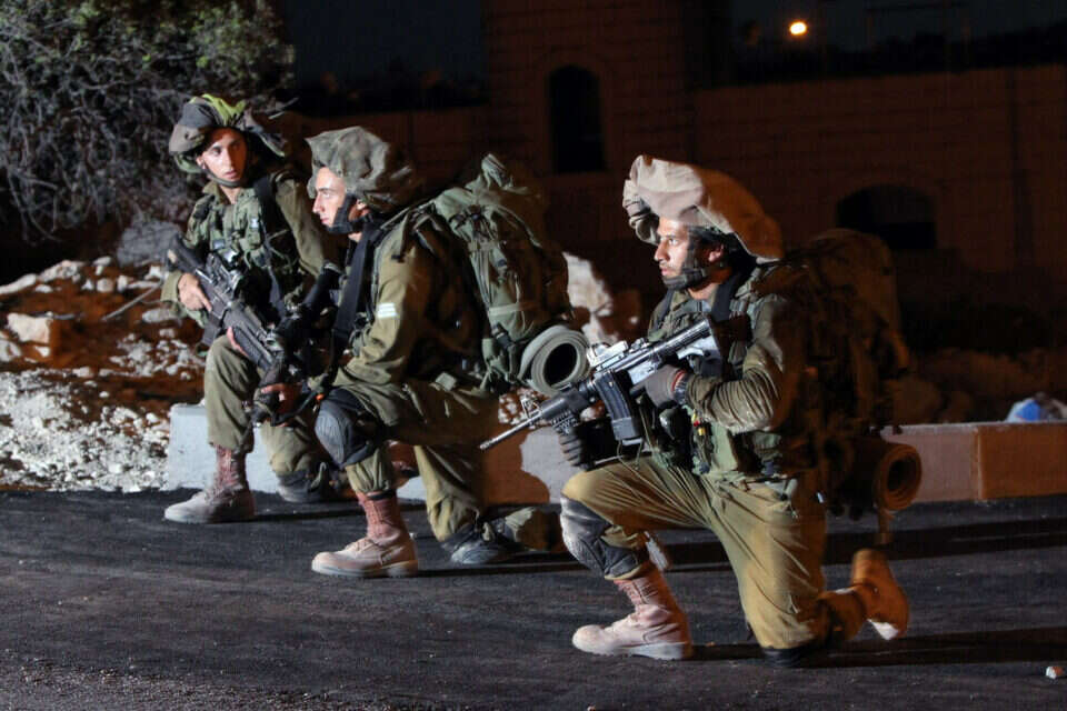 כוחות צה"ל במהלך הפעילות הלילה // צילום: אי.אף.פי // כוחות צה"ל במהלך הפעילות הלילה , 