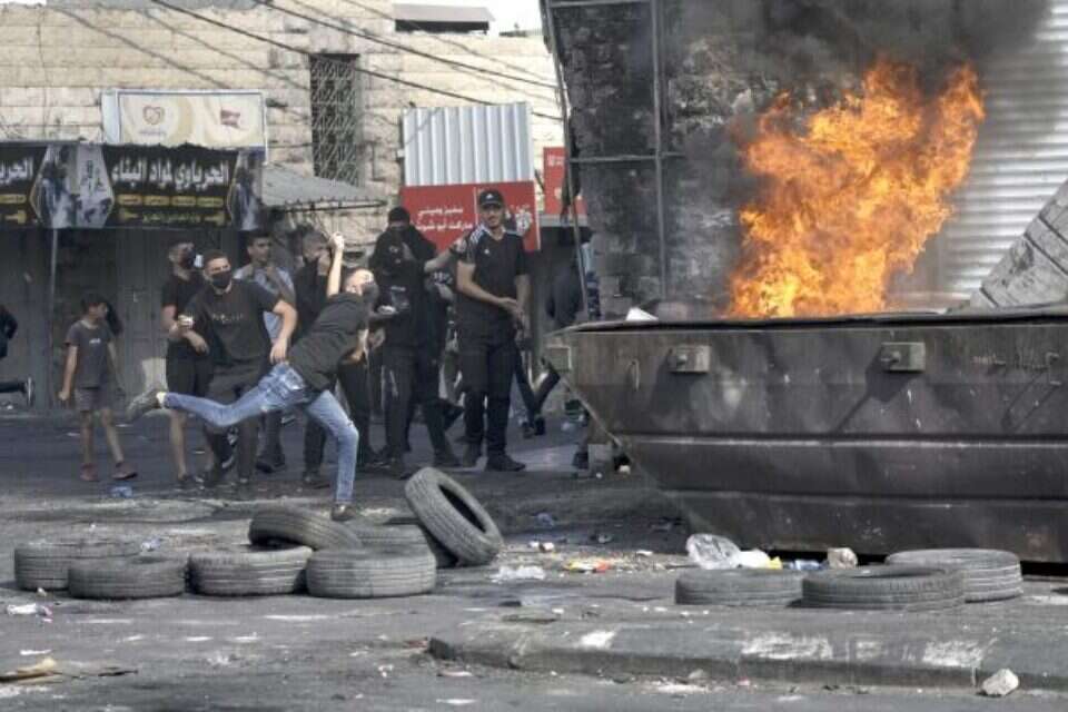 מתפרעים במחנה שועפאטצילום ארכיון: אי.פי