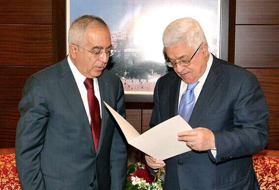 קול אחר. פיאד (משמאל) עם אבו מאזן // צילום: GettyImages