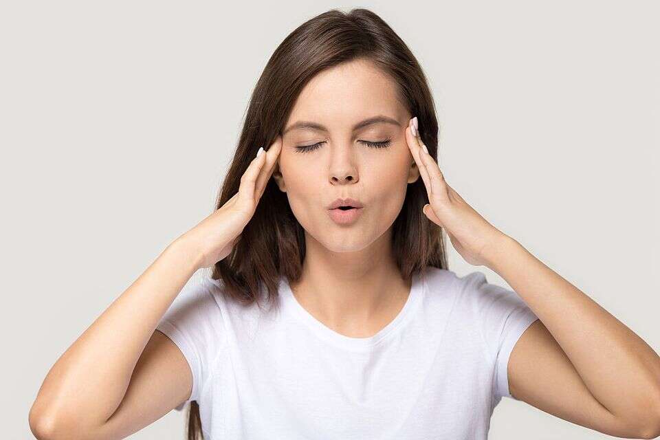 Stressed teen girl calming down relieving headache emotional stress relief, nervous young woman meditating massaging temples doing breathing exercises isolated on white grey studio blank background *** Local Caption *** 02.03.21
20.06.23 , GettyImages
