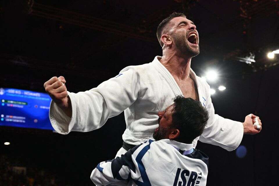 פלצ'יק חוגג עם סמדג'ה באולימפיאדה בפריז , רויטרס