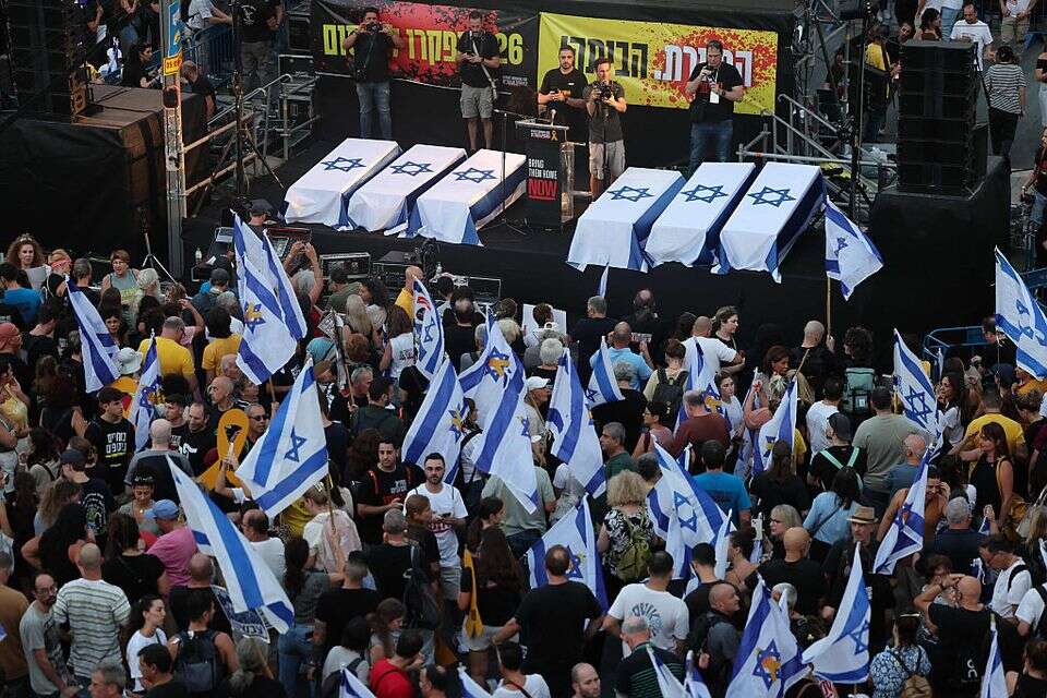 מיצג גופות החטופים בת"א, אתמול , AFP