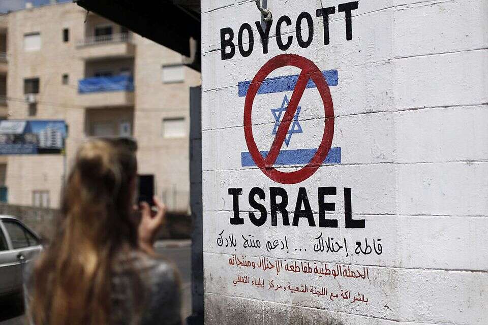 שלט הקורא להחרמת ישראל , אי.אף.פי