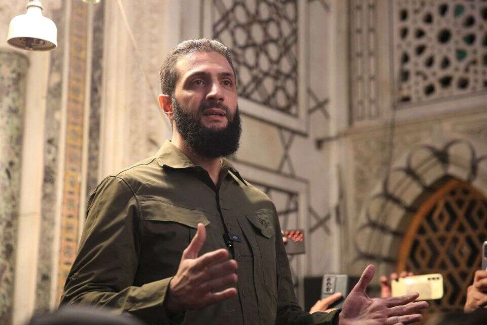 מנהיג המורדים הסורים אל ג'ולאני , ללא קרדיט