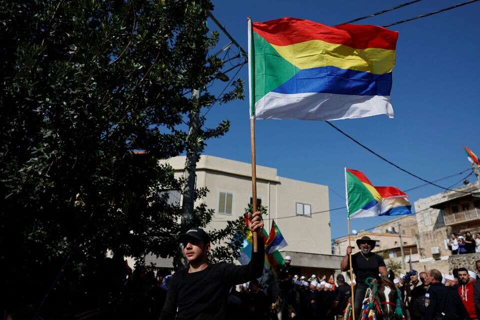 דורזים בישראל ממתינים לאחיהם מסוריה , REUTERS/Ammar Awad
