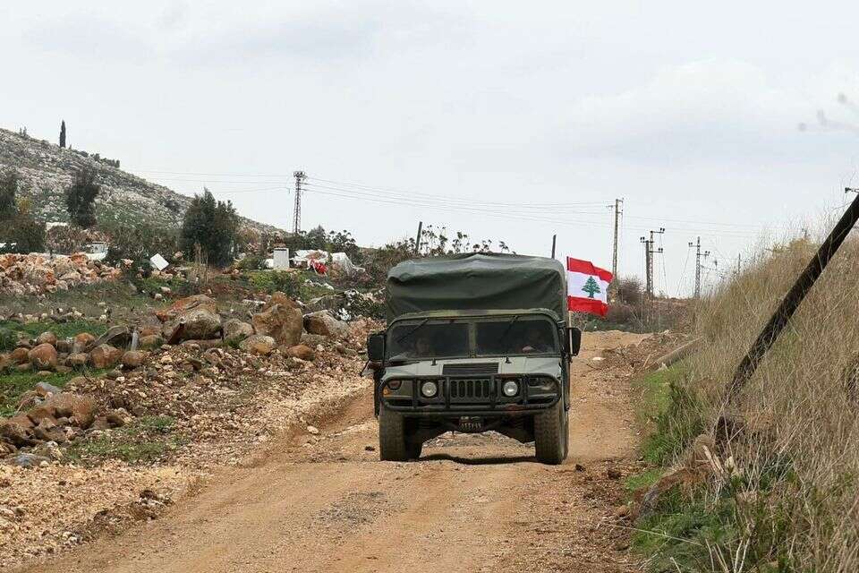 A Lebanese army jeep patrols in the southern Lebanese border village of Sarada after Israeli forces pulled out, on February 19, 2025. Israeli forces withdrew from a series of border villages including southeast Lebanon's Odaisseh, Kfar Kila, Mais al-Jabal, Markaba and Hula under an extended ceasefire deadline that expired on February 18, but remained in five points near the border. (Photo by Rabih DAHER / AFP) *** Local Caption *** 04.03.25 , אי.אף.פי