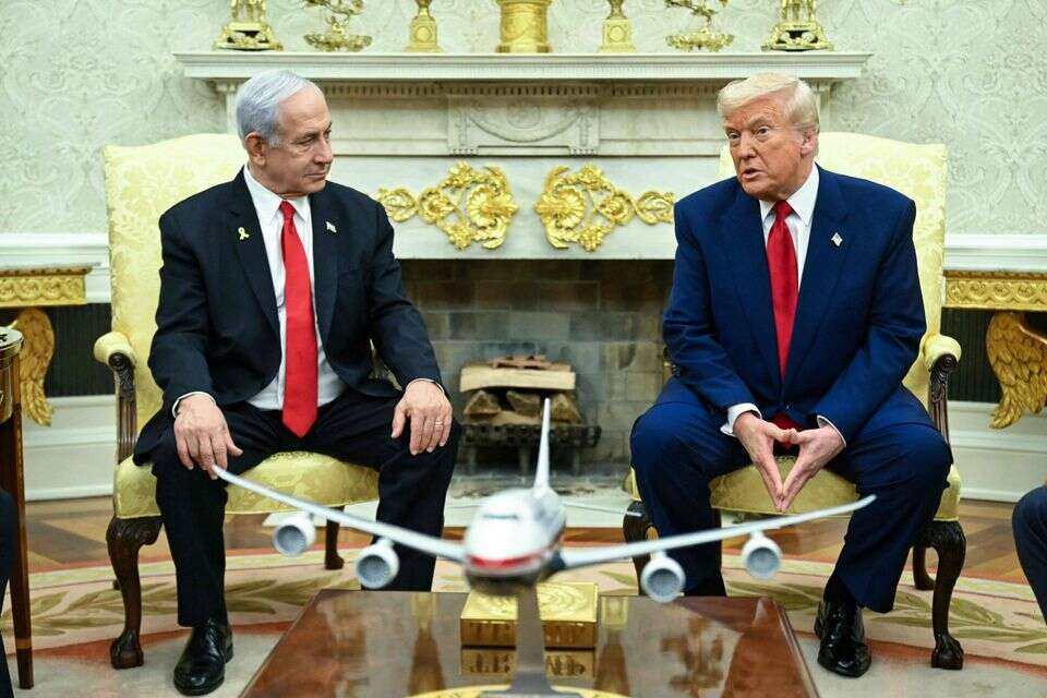 טראמפ לצידו של נתניהו בחדר הסגלגל (ארכיון) , אי.אף.פי