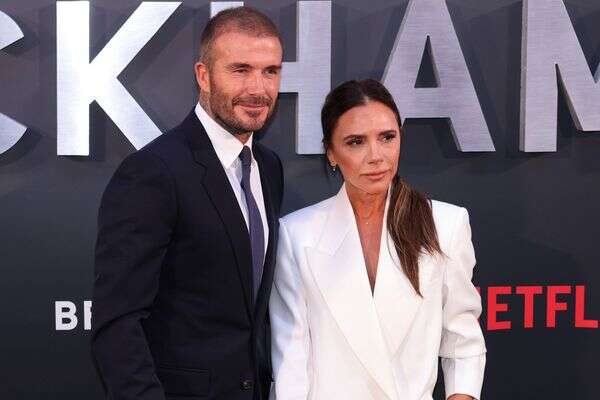 ויקטוריה ודייוויד בקהאם , AP Photo/Vianney Le Caer, File