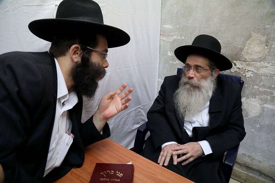 הרב שרגא שטינמן מימין , גדעון מרקוביץ