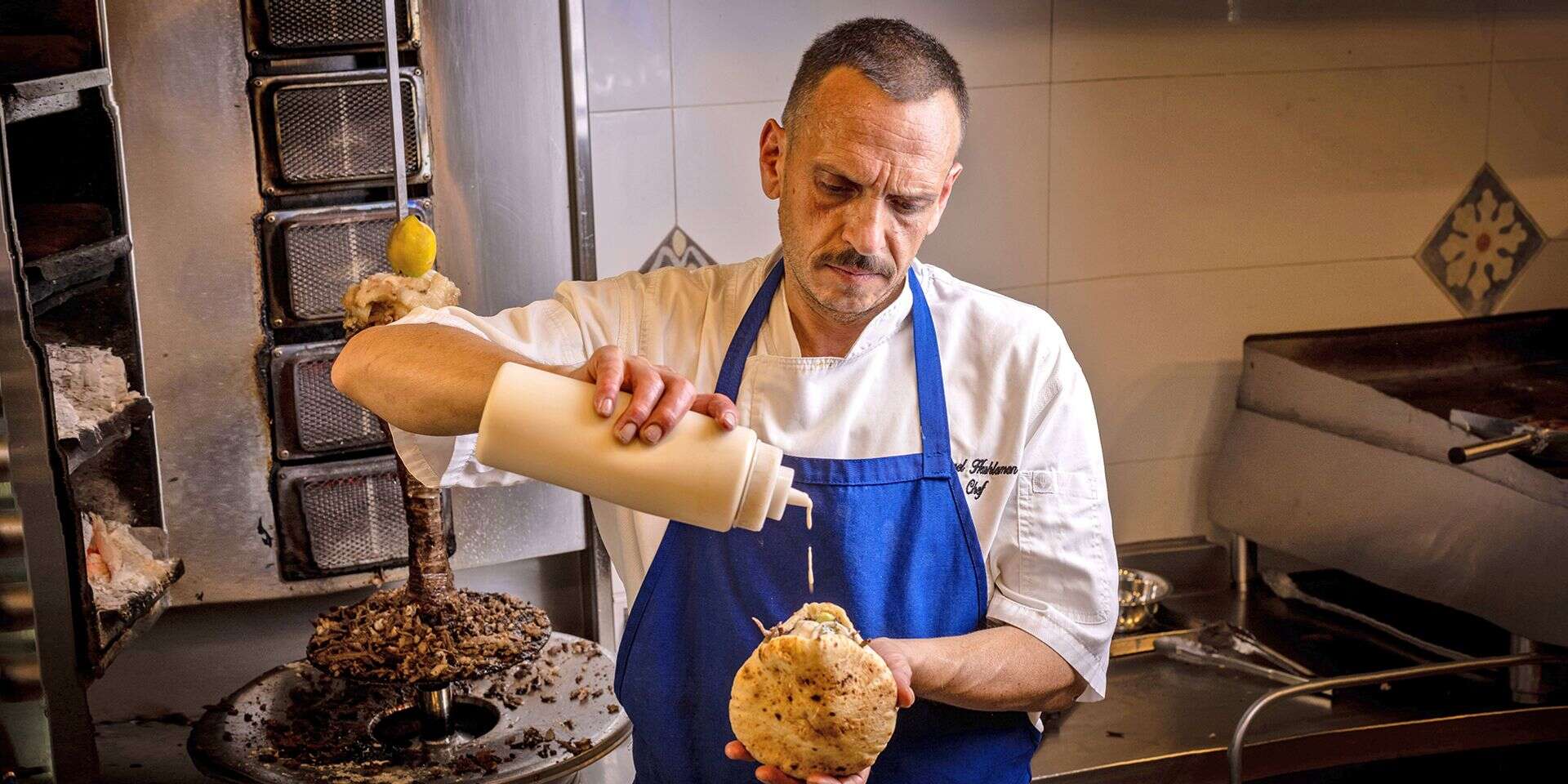 חוכמה יוצאת דופן בידיים. השף כאמל השלמון ב"אבו סאמי" , אריק סולטן