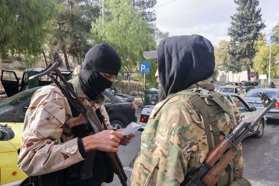 בדיקת פתע של תעודות בשכונה עלאווית בדמשק , אי.פי.אי