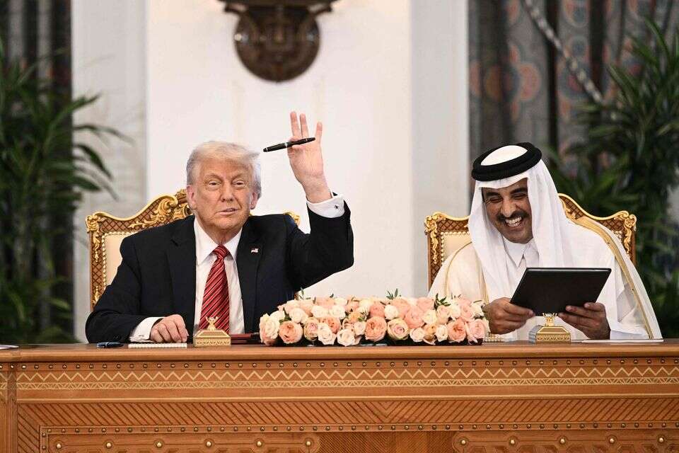 שליט קטאר אל ת'אני וטראמפ.  , אי. אף. פי