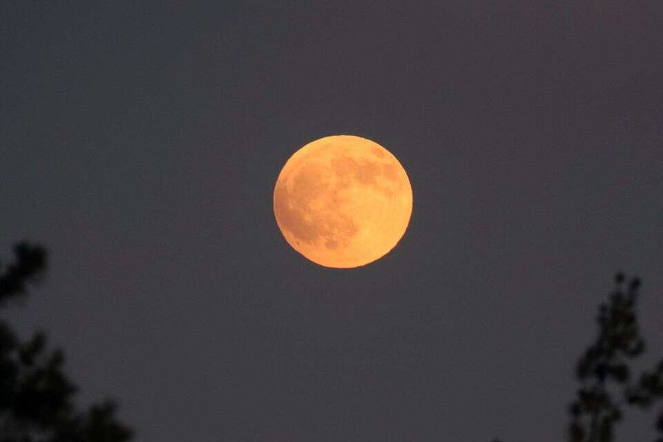 epa12359955 Blood moon rises above Jerusalem, 07 September 2025.  EPA/ABIR SULTAN , EPA