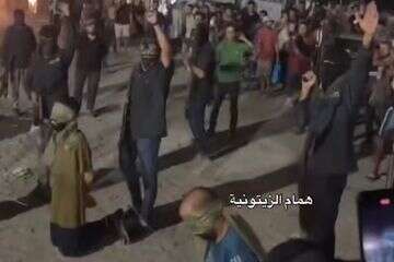 חמאס ביצע הוצאה להורג בפומבי של שלושה פלשתינים בלב העיר עזה , ללא קרדיט