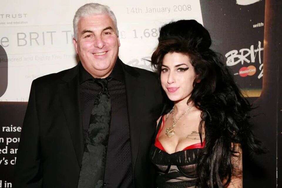 איימי ווינהאוס ואביה מיץ' , JMEnternational/Getty