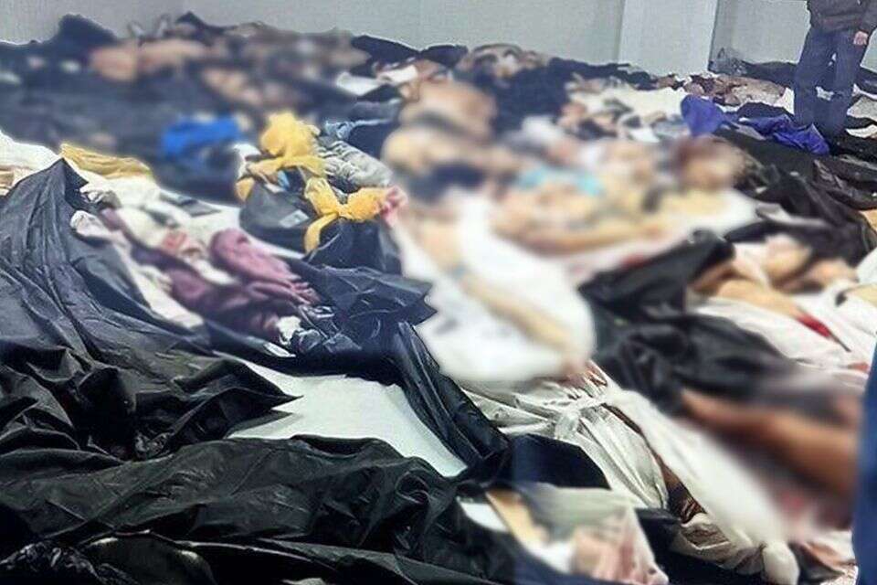 חדרים צפופים מלאים בגופות. המכון הפתולוגי בכהריזק שבדרום טהרן , ללא